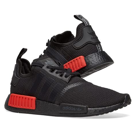 adidas nmd black orange|nmd r1 core black red.